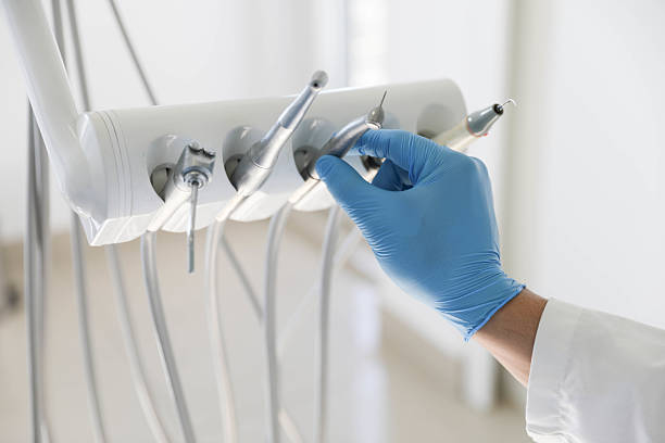 Professional Tooth Extraction technician working in Powderly, TX